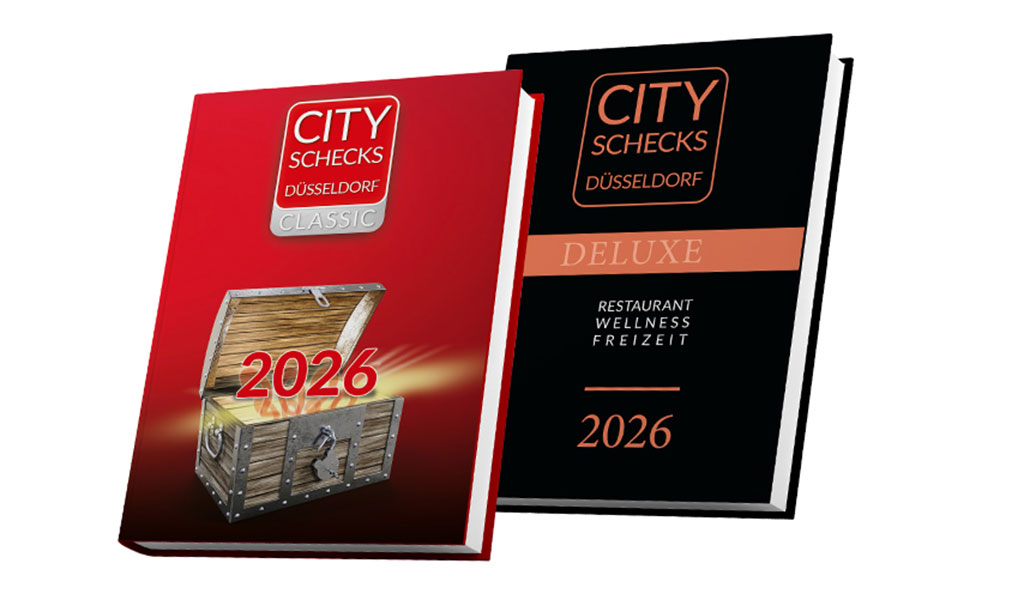 Zwei City-Schecks-Düsseldorf-Jahresbücher 2026 in Rot und Schwarz.