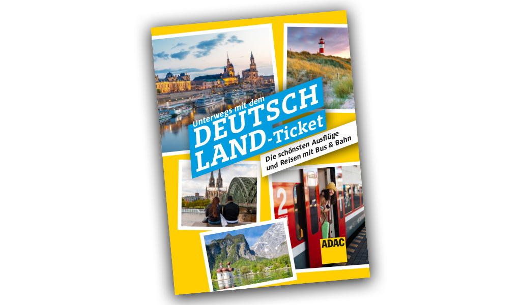 Ein Magazin mit gelbem Rand zeigt Reiseziele in Deutschland und einen roten Zug